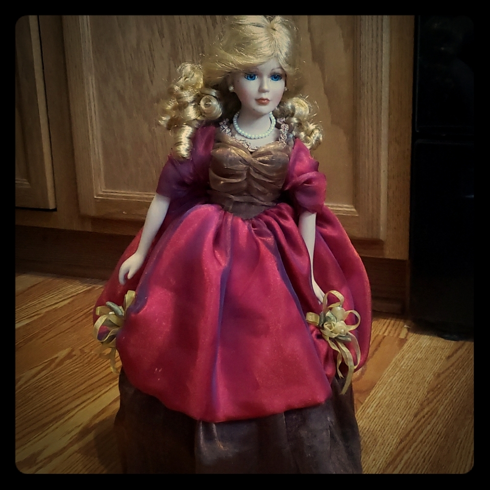 Porcelain Doll on stand